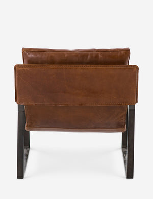 Rear view of brown leather Marlyne sling-back accent chair with black metal frame