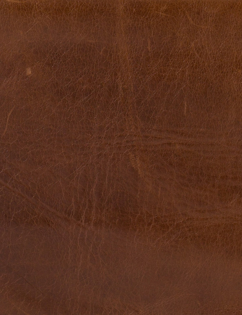| Close-up of the brown leather for the Marlyne accent chair