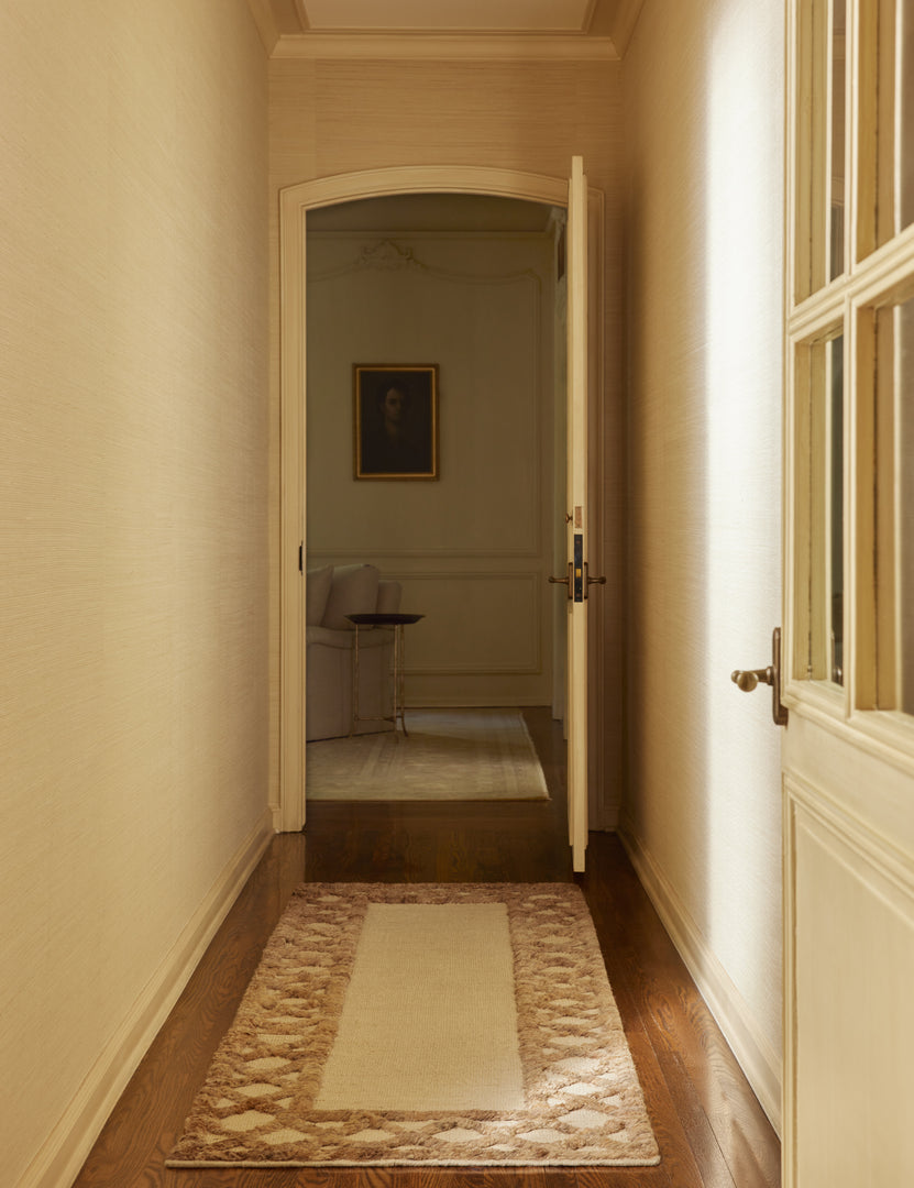 #color::natural-and-ivory #size::2-6--x-8--runner | A hallway featuring the Clairmont Handwoven Lattice Border Jute Rug by Jake Arnold in the runner size