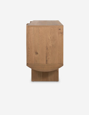 Side profile of the Remwald sculptural oak wood sideboard cabinet.