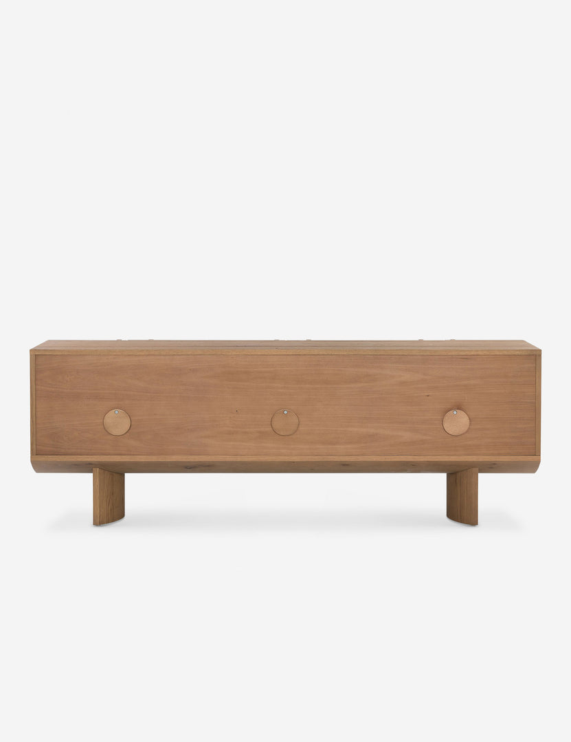 #color::natural | Back of the Remwald sculptural oak wood low profile media console with cable cutouts.