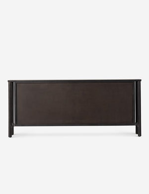 Back of the Isaura black cane-paneled sideboard cabinet.