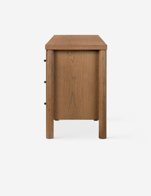 Side profile of the Kisner natural grain oak dresser.