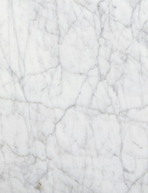 Close up of the stone of the Ozawa mixed-material, marble top side table.