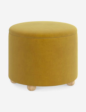 Angled view of the Kamila Citronella Yellow Velvet 24-inch ottoman