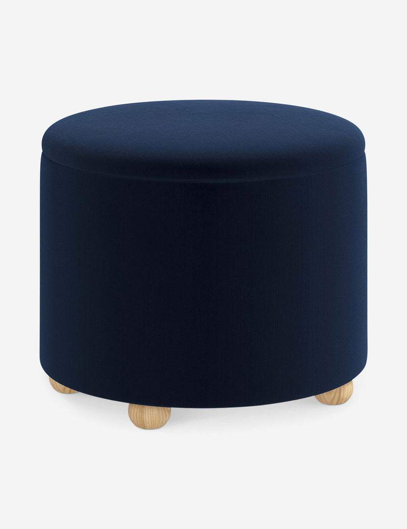 #color::navy-velvet #size::24-Dia | Angled view of the Kamila Navy Velvet 24-inch ottoman