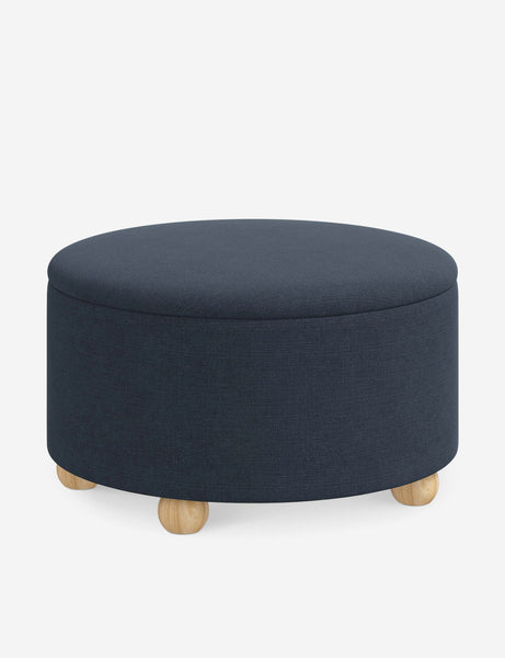 #color::navy-linen #size::34-Dia | Angled view of the Kamila Navy Linen 34-inch ottoman