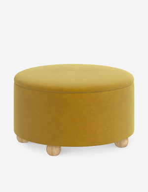 Angled view of the Kamila Citronella Yellow Velvet 34-inch ottoman