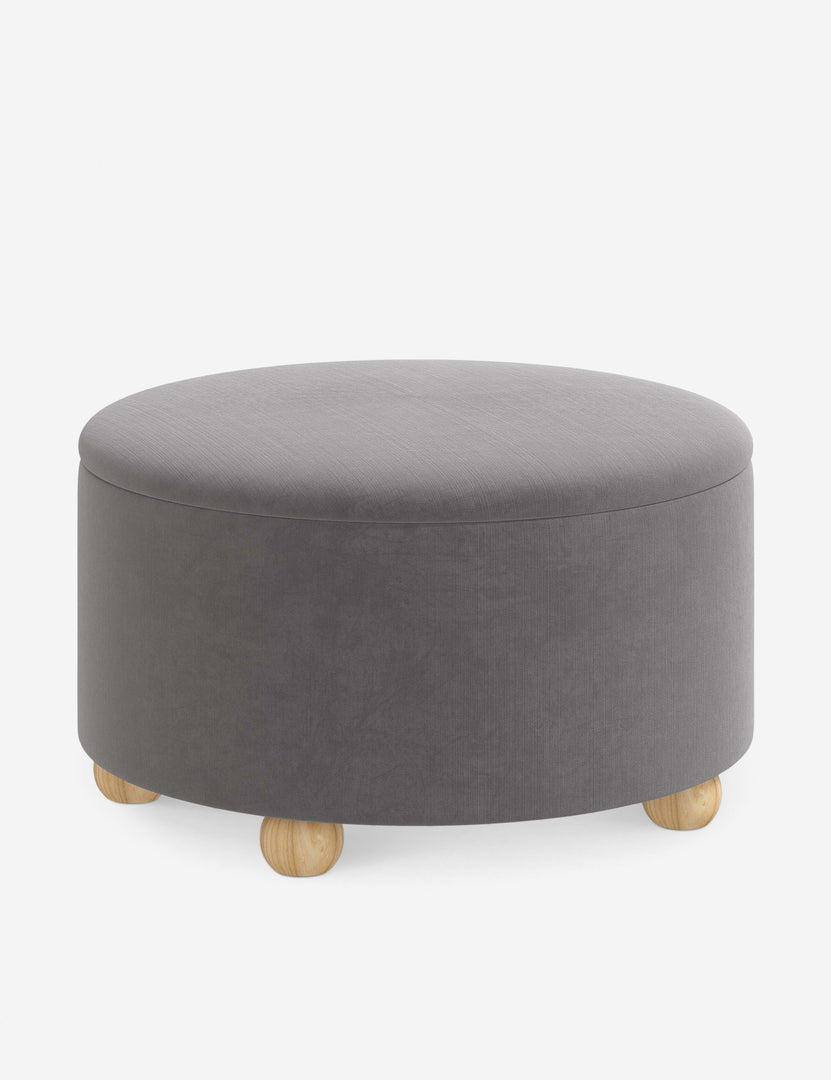 #color::steel-velvet #size::34-Dia | Angled view of the Kamila Steel Gray Velvet 34-inch ottoman