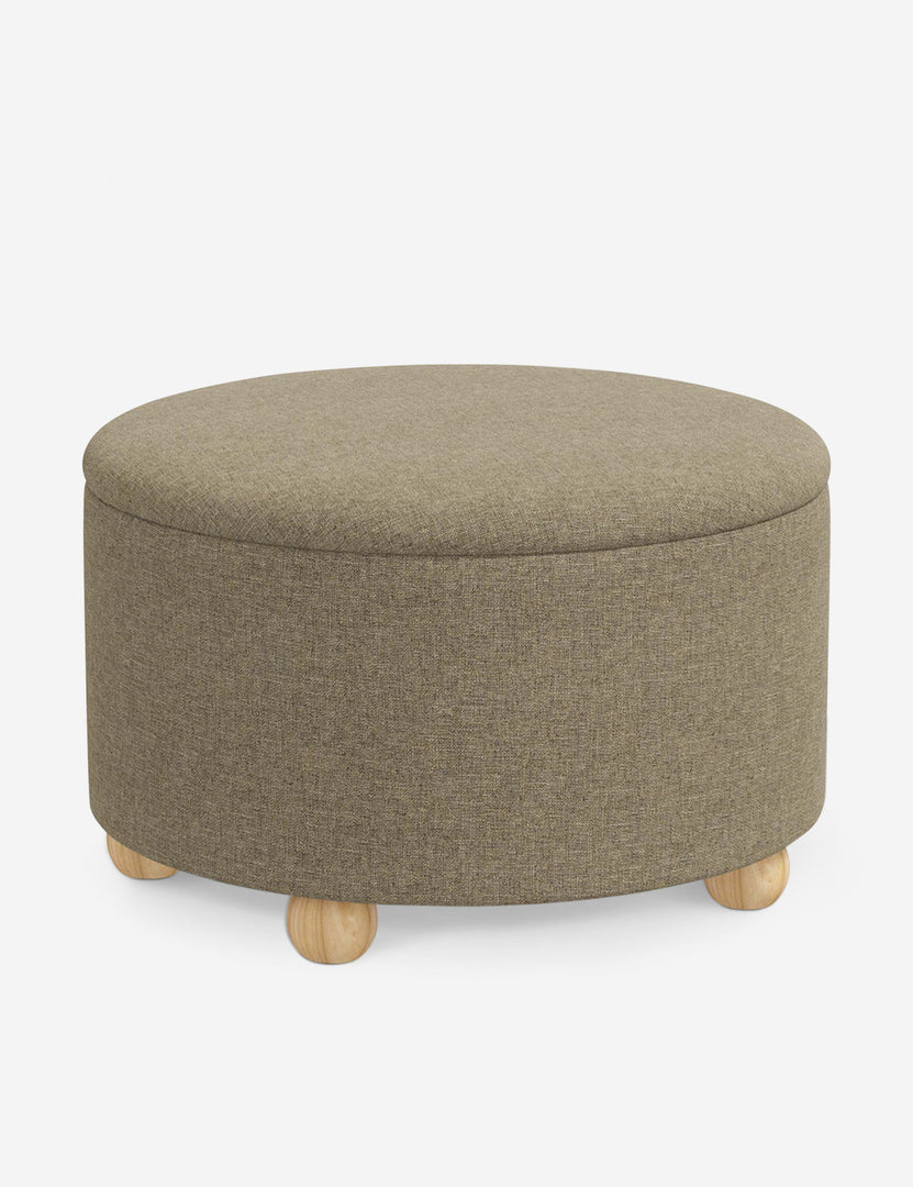 #color::pebble-linen #size::34-Dia | Angled view of the Kamila Pebble Gray Linen 34-inch ottoman