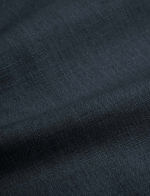 Detailed shot of the navy linen on the Adara navy linen upholstered bed.