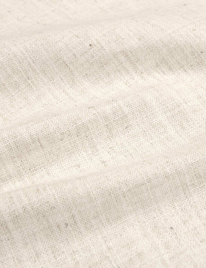 Detailed shot of the linen on the Adara talc linen upholstered bed.