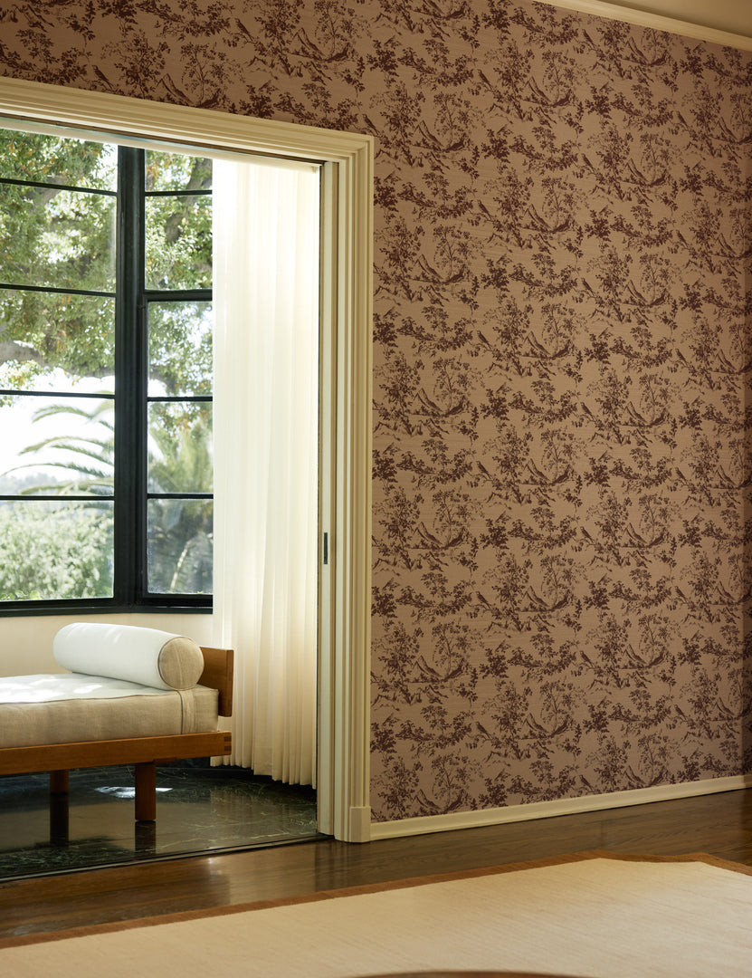 #color::bordeaux | A room with a sitting nook with a bench featuring the Dors Grasscloth Wallpaper by Jake Arnold