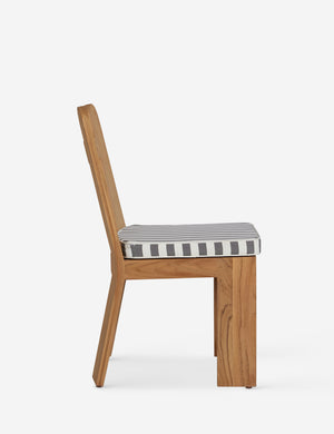 Side profile of the Abbot solid teak sculptural outdoor dining chair by Sarah Sherman Samuel.