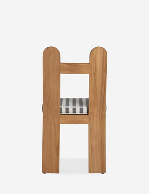 Back of the Abbot solid teak sculptural outdoor dining chair by Sarah Sherman Samuel.