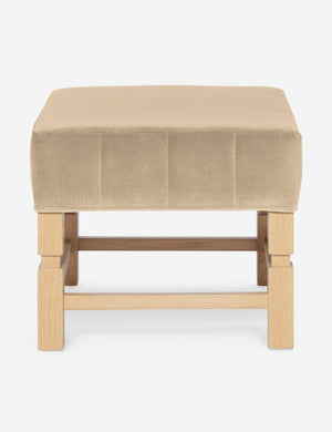 Ambleside Brie beige velvet upholstered ottoman by Ginny Macdonald with a carved frame and vertical channeling on the cushion