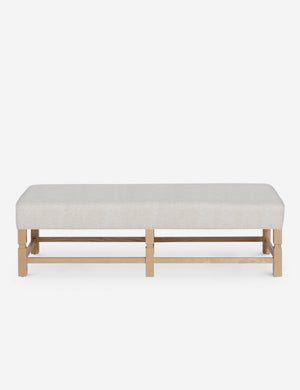 Ambleside Taupe Boucle upholstered bench with carved detailing on the frame and vertical channeling around the cushion by Ginny Macdonald
