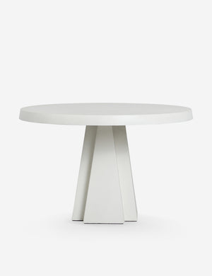 Avila modern round pedestal dining table.
