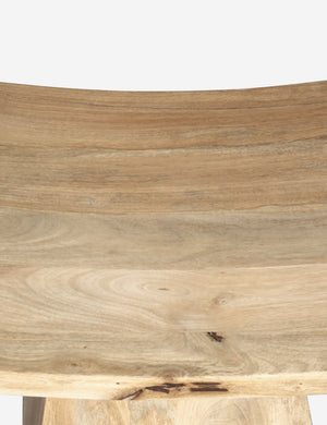 Wood grain of the Peck minimalist wood stool.