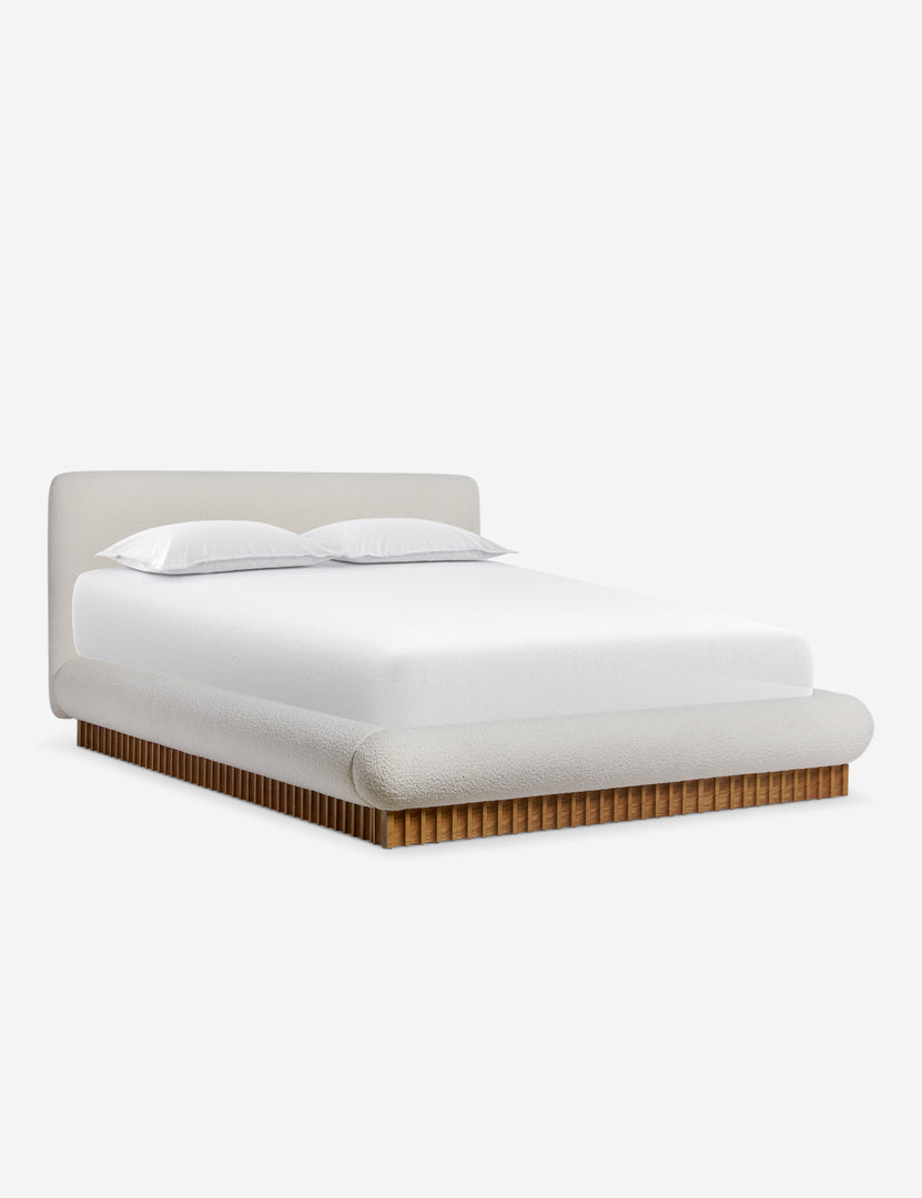 #color::ivory-boucle #size::queen #size::king | Angled view of the Billow overstuffed boucle upholstered bed with wooden base