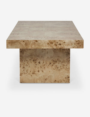 Side view of the Brisa rectangular burl wood coffee table with four legs