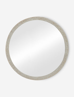 Correa round distressed wood frame wall mirror.