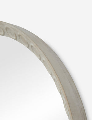 Close up of the Correa round distressed wood frame wall mirror.