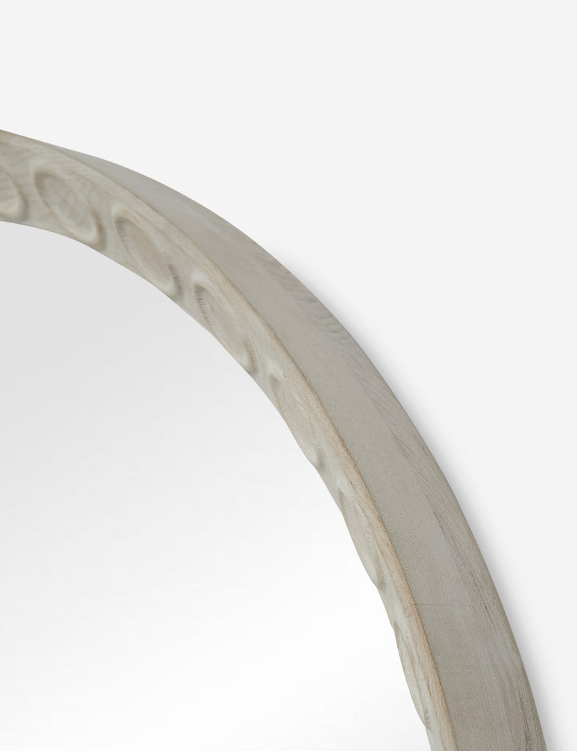 #color::natural | Close up of the Correa round distressed wood frame wall mirror.