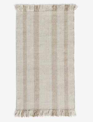 Small Croze handwoven striped fringed outdoor rug.