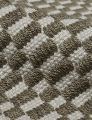 Close up of the Dante handwoven checkerboard outdoor rug.
