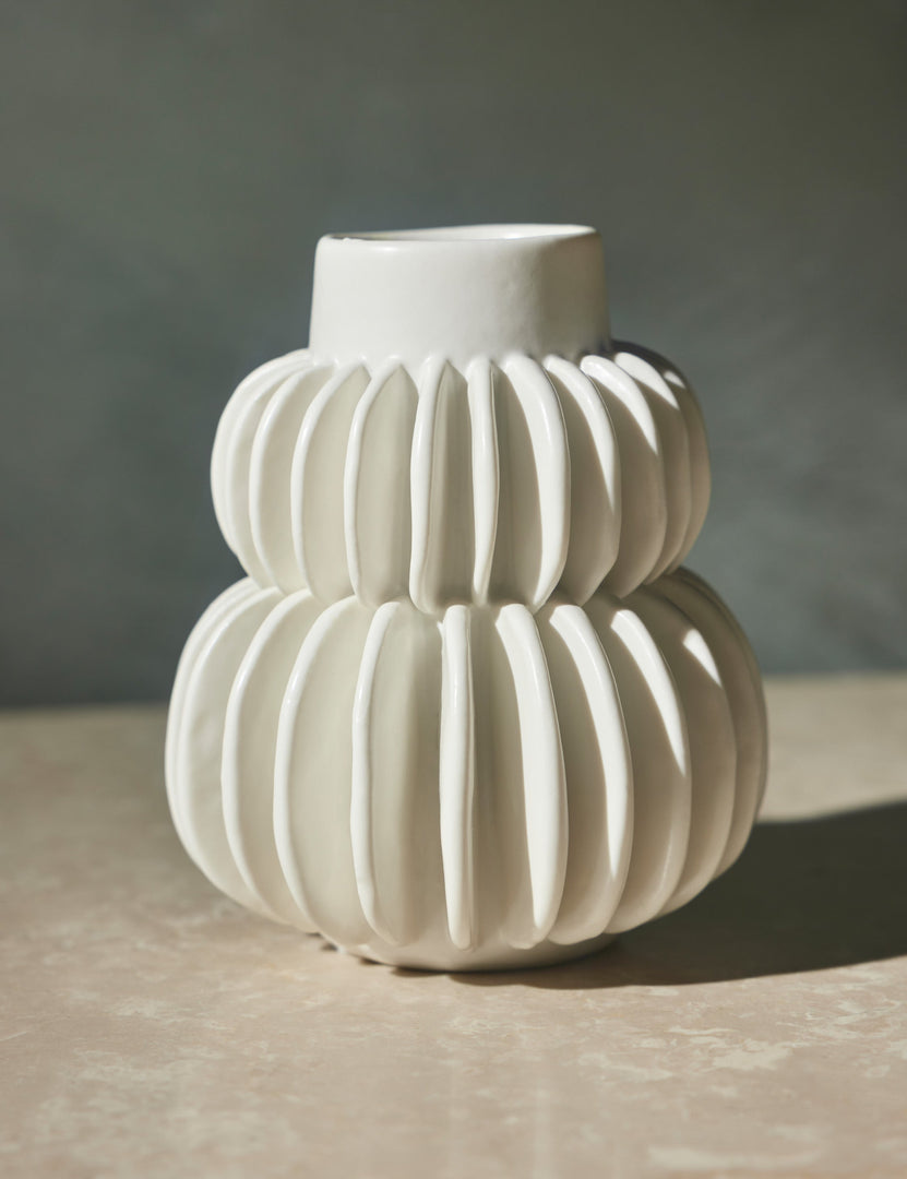 #color::white | Delilah white ceramic vase featuring two rows of half-moon discs fanned around a tapered body