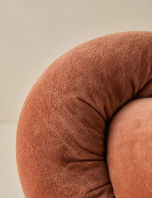 Close up of the Dewey velvet knot ball pillow.