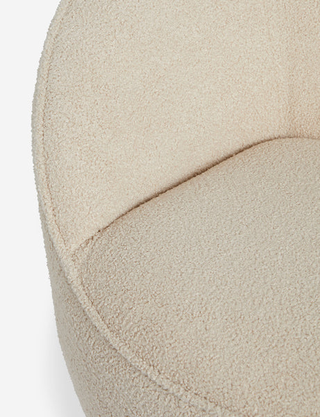 #color::teddy-boucle | Close up view of the Fern scalloped back boucle upholstered swivel chair