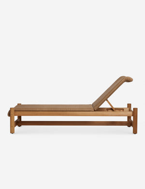 Side profile of the Gally wicker and teak outdoor chaise.