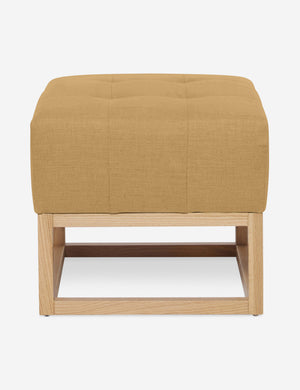 Camel Linen Grasmere Ottoman with an upholstered cushion and airy wooden frame by Ginny Macdonald