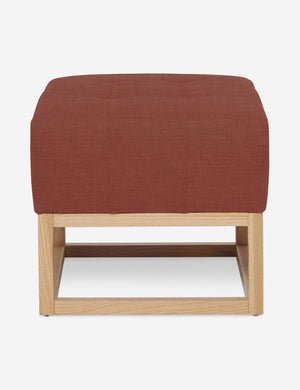 Terracotta Linen Grasmere Ottoman with an upholstered cushion and airy wooden frame by Ginny Macdonald