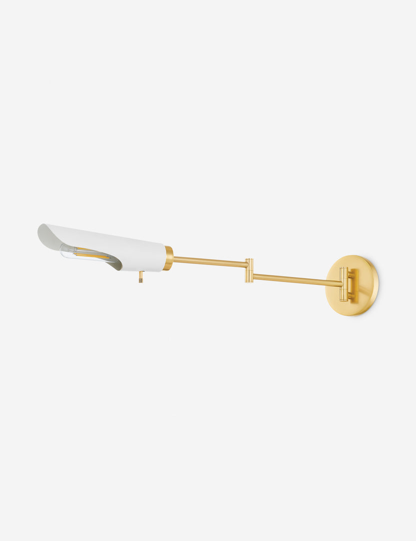 #color::brass | Rinaldi modern brass finish swing arm sconce.