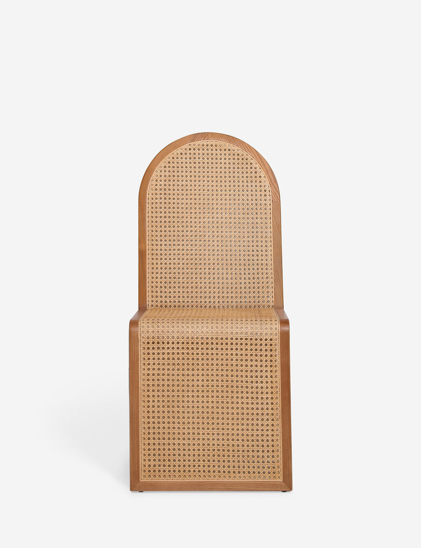 #color::light-espresso | Head on view of the Kapok woven cane sculptural dining chair by Carly Cushnie.