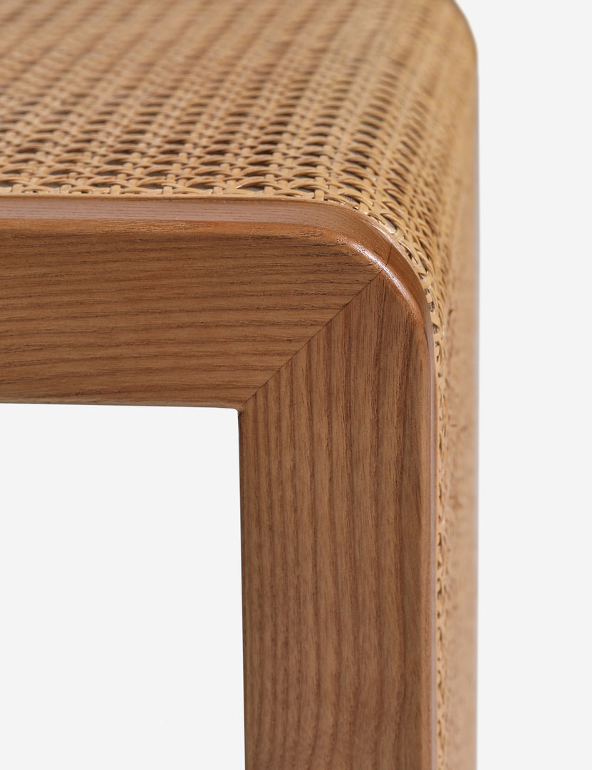 #color::light-espresso | Close up of the Kapok woven cane sculptural dining chair by Carly Cushnie.
