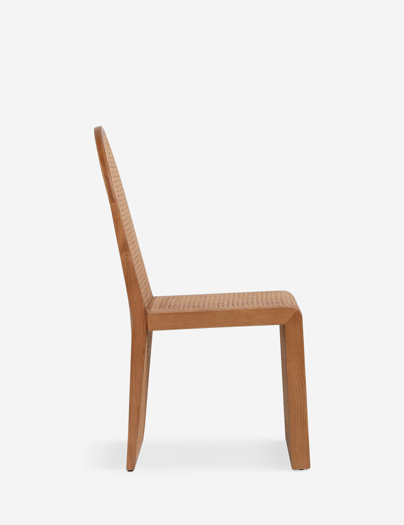 #color::light-espresso | Side profile of the Kapok woven cane sculptural dining chair by Carly Cushnie.