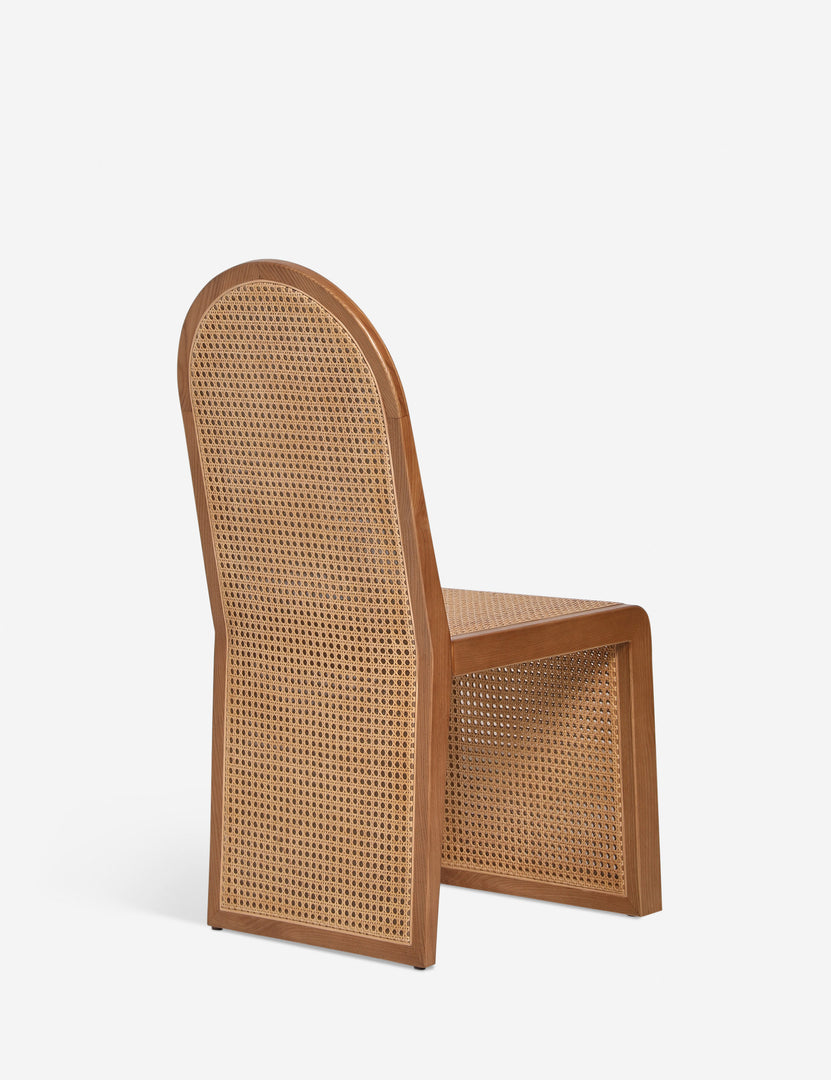#color::light-espresso | Angled back view of the Kapok woven cane sculptural dining chair by Carly Cushnie.