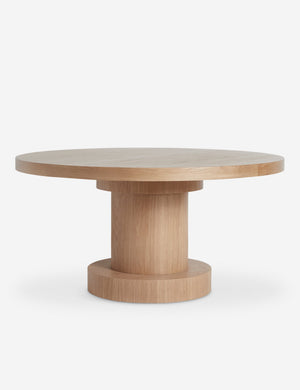 Karine round natural wood pedestal dining table
