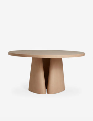 Keating sculptural round fiberstone outdoor dining table.