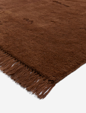 Corner of the Koukero irregular shaped fringe wool area rug