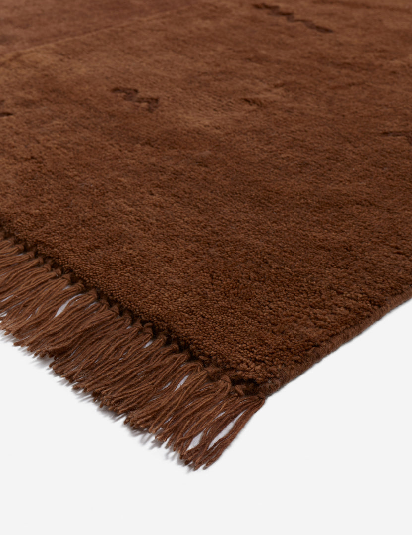 #size::6--x-9- #size::8--x-10- #size::9--x-12- #size::10--x-14- #size::12--x-15- | Corner of the Koukero irregular shaped fringe wool area rug