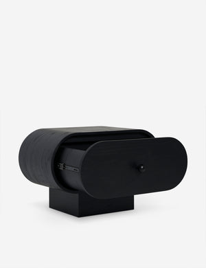 Laughlin retro pill shaped nightstand in black with drawer open