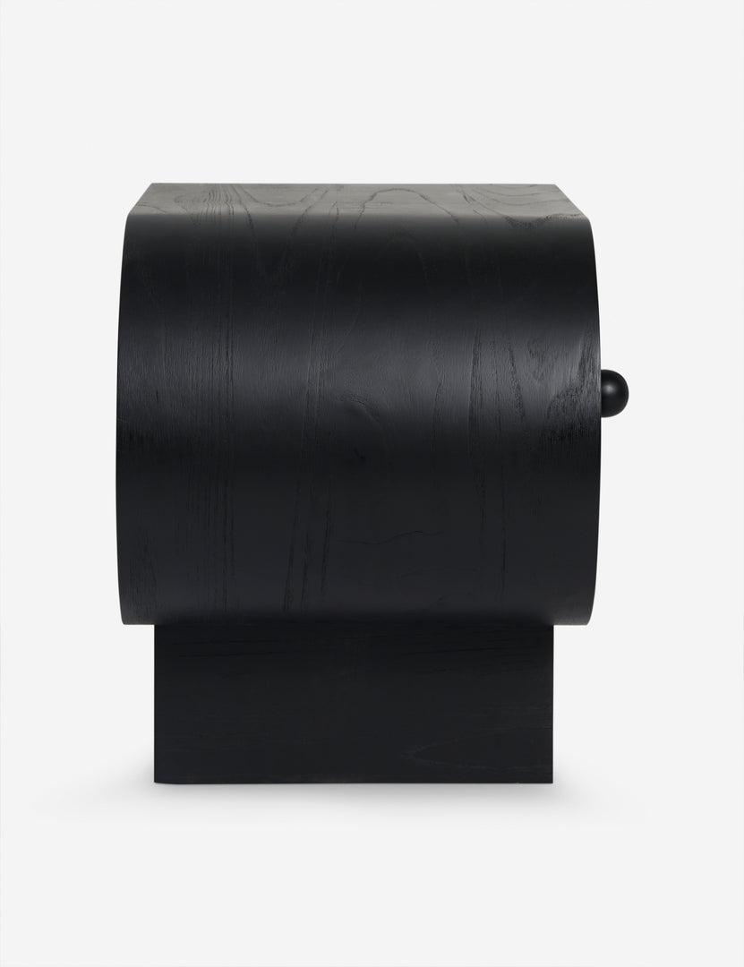 #color::black | Side view of the Laughlin retro pill shaped nightstand in black