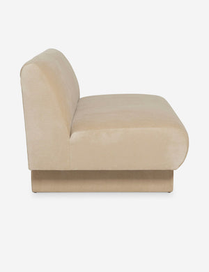 Side view of the  Centerpiece of the Lena beige velvet sectional sofa with upholstered beam legs