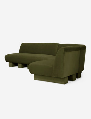 Angled view of the Lena right-facing gray velvet sectional sofa with upholstered beam legs.