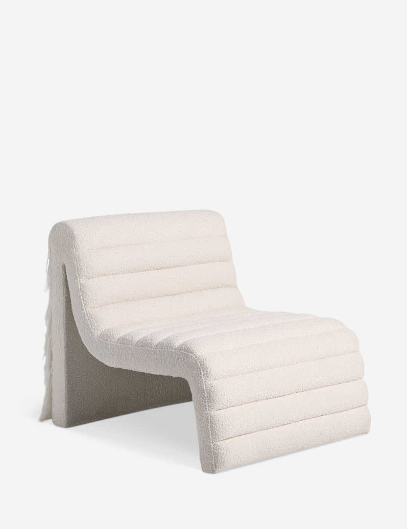 #color::ivory-boucle | Leon textural boucle channel tufted armless accent chair by Carly Cushnie.